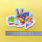 Photo of one of the stickers against a ruler to show it's size.