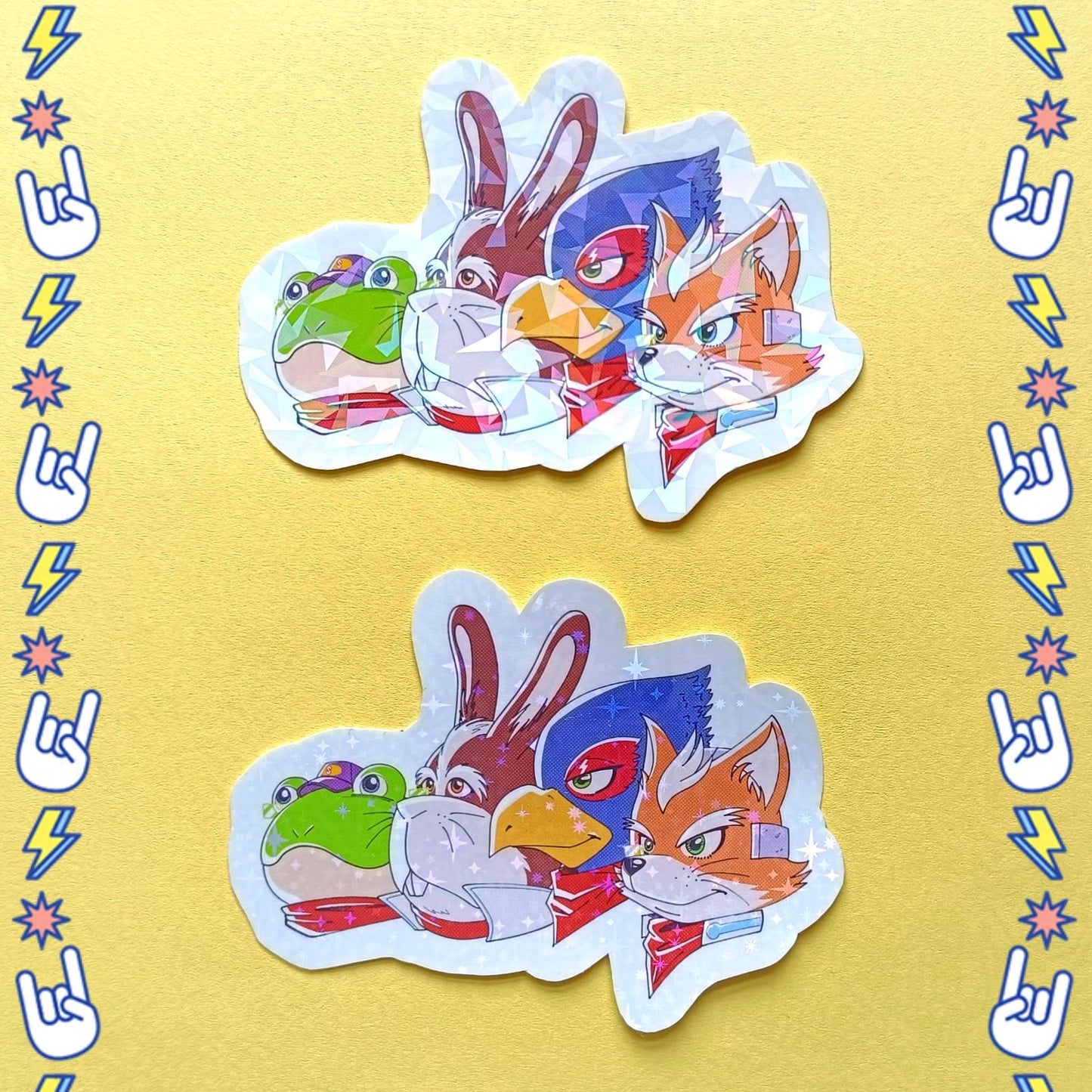 Photo of a holographic sticker featuring the whole StarFox team - Fox, Falco, Peppy and Slippy. The sticker comes in one of two different holographic design patterns.